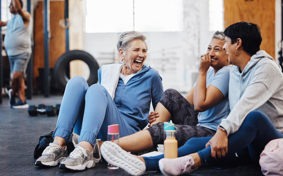 Photo of old people having fun at a gym